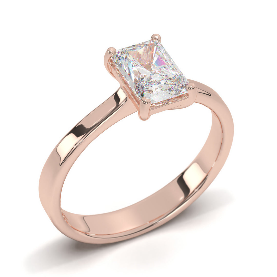 AurÃ©lie  Emerald Solitaire with Tapered Band