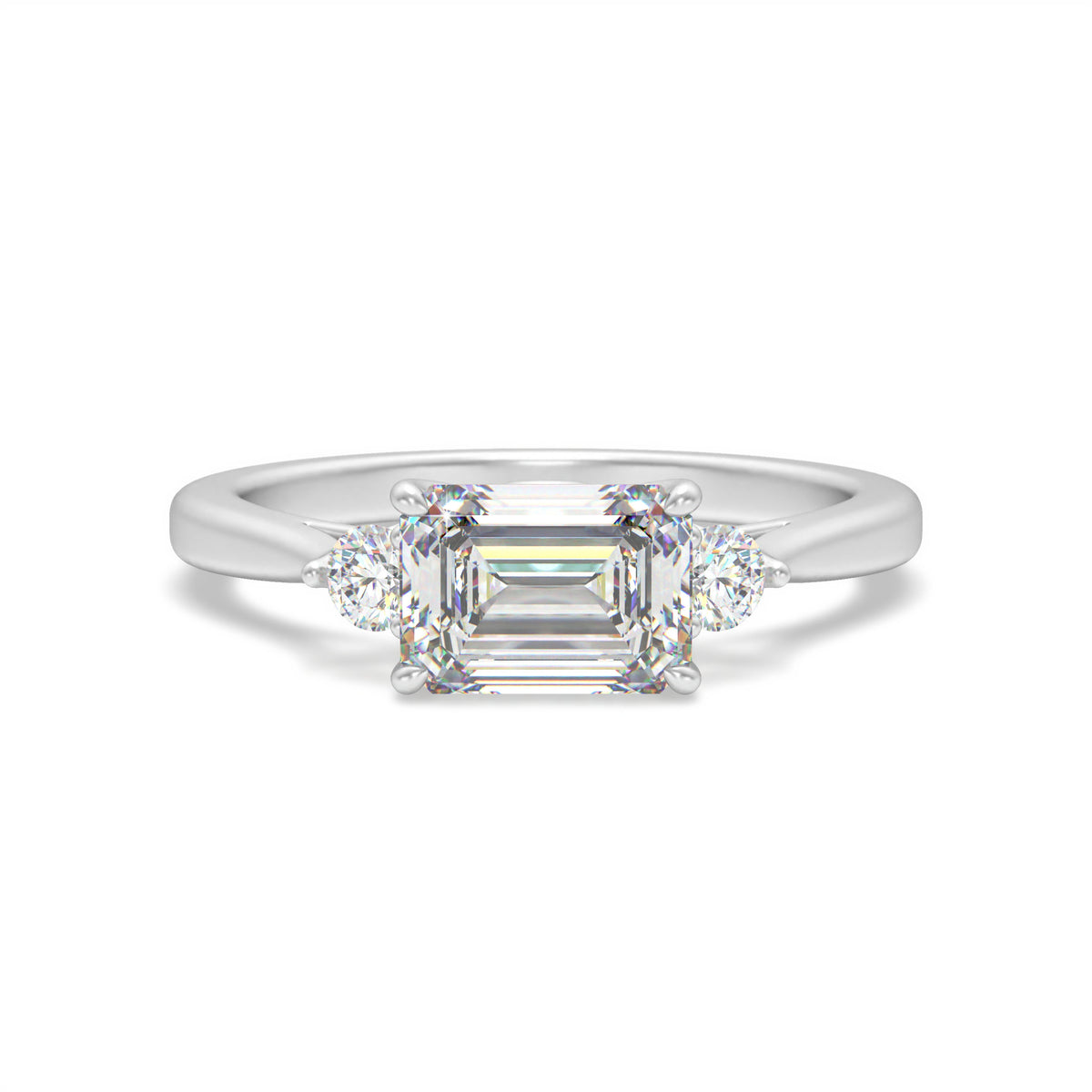 Ludovica <br> elegant three stone emerald diamond ring